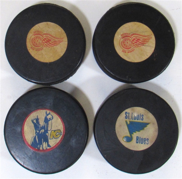 Lot of 4 NHL GU Hockey Pucks K.C. Scouts, 2x  Detroit Red Wings, and St. Louis Blues 