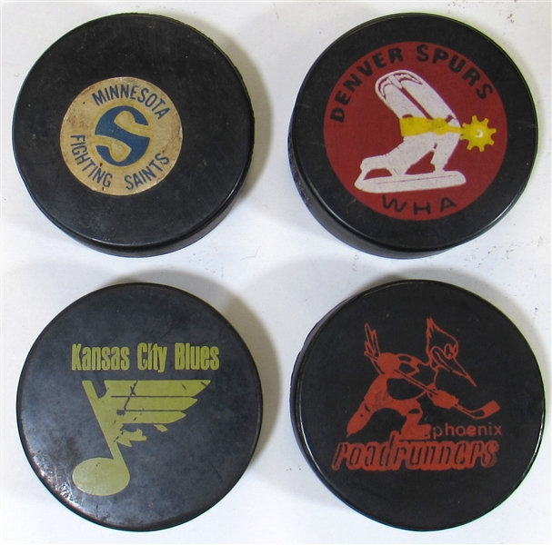 Lot Of 4 WHA Hockey Pucks Denver Spurs, Minnesota Fighting Saints, Phoenix Roadrunners, and KC Blues